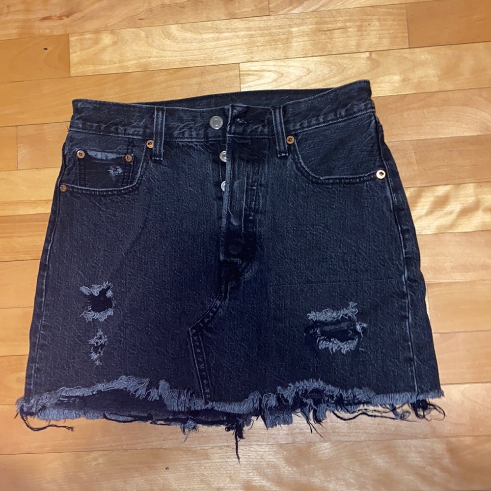 Levi’s black ripped jean skirt